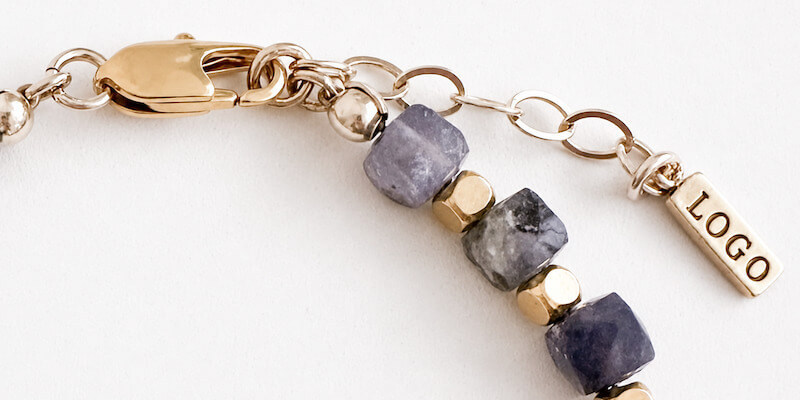 Clasp & Logo Charm 1