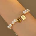 Good Luck Plate Charm 6-7mm Natural Baroque Freshwater Pearl Bracelet 2