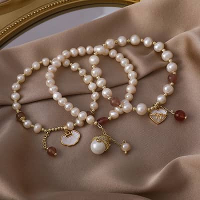 18K Gold Plated Chinese Style Handmade Bead Bracelet with Strawberry Crystal, Opal, Pearl, and Lock Love Pendant detail 3