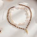 Trendy Hand Woven Ocean Puka Shell Choker Fashion Coconut Wood Beaded Fake Shark Tooth Charm Necklace 3
