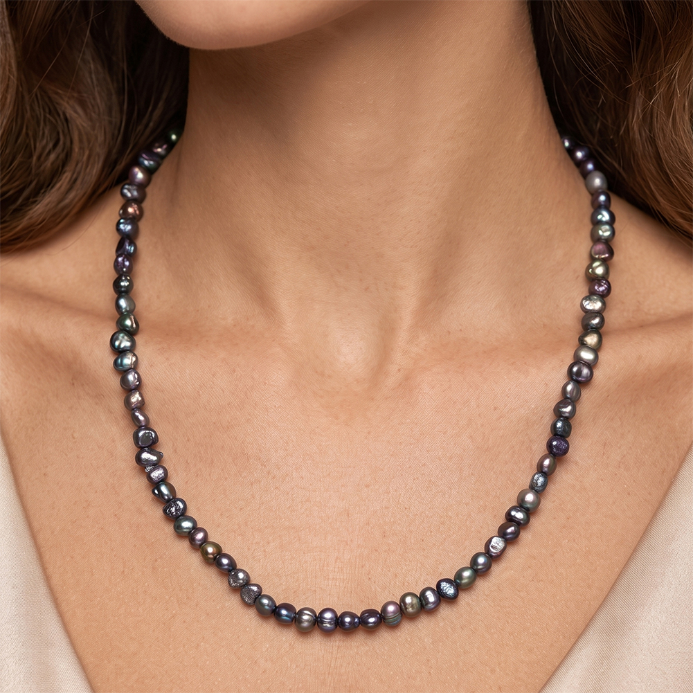 Dark irregular freshwater pearl necklace worn on model