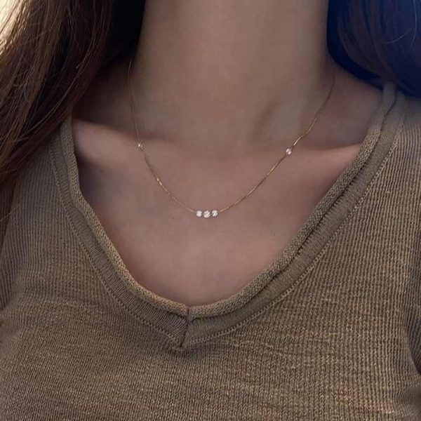 Laser Holed Diamond Necklace for Women 0.5 Carat round Brilliant Cut Yellow Gold with Lab Grown Diamonds